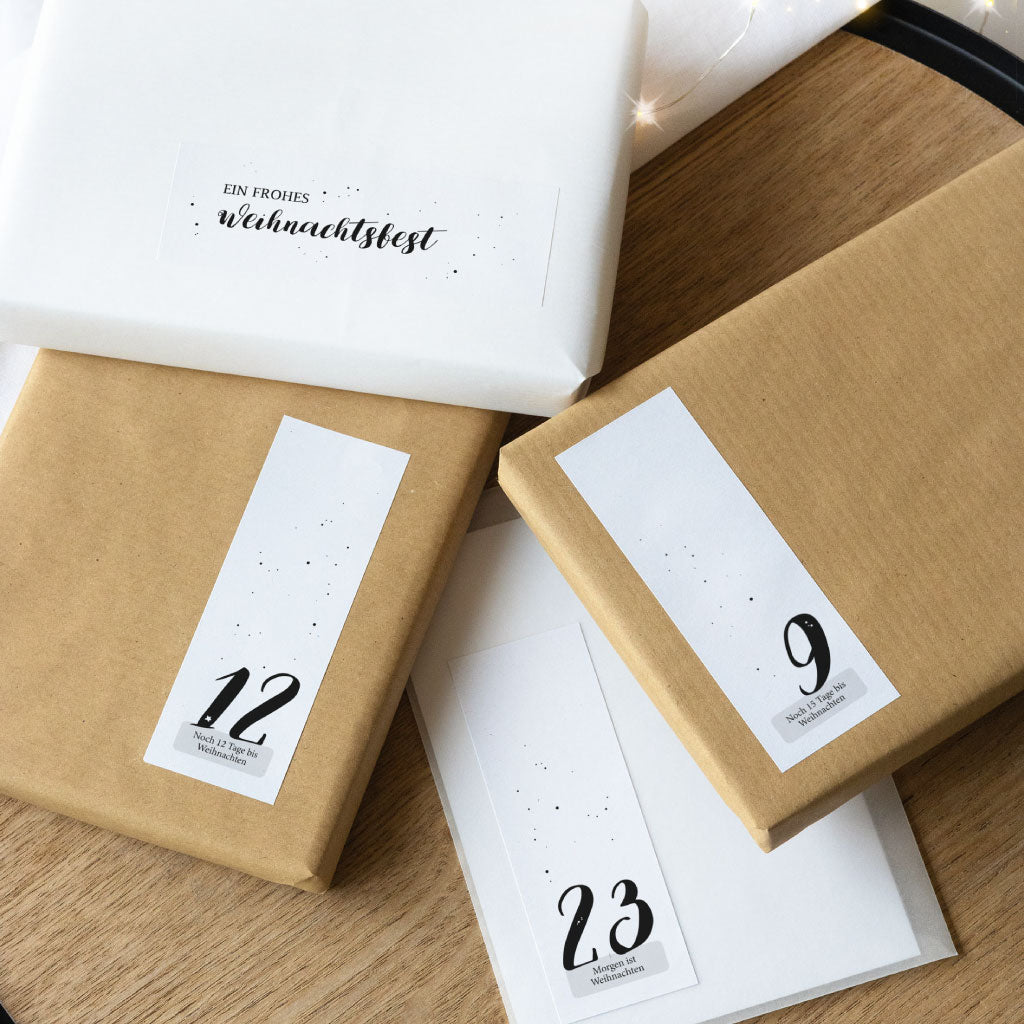 24 Adventskalender Zahlen Sticker auf kleinen Geschenken und Tüten