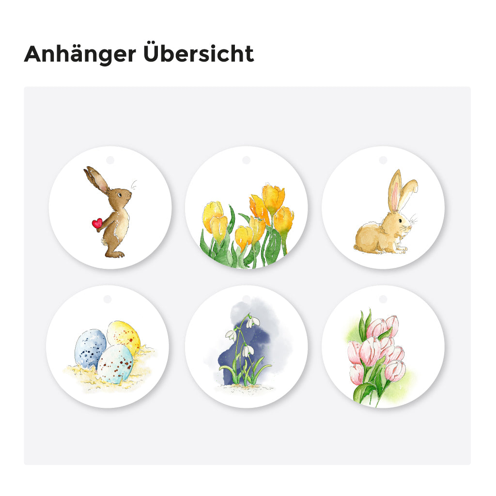 Übersicht der runden Anhänger mit Aquarellmotiven: Osterhase, Ostereier, Tulpen, Schneeglöckchen – dekorativ zum Ostergeschenke verpacken.