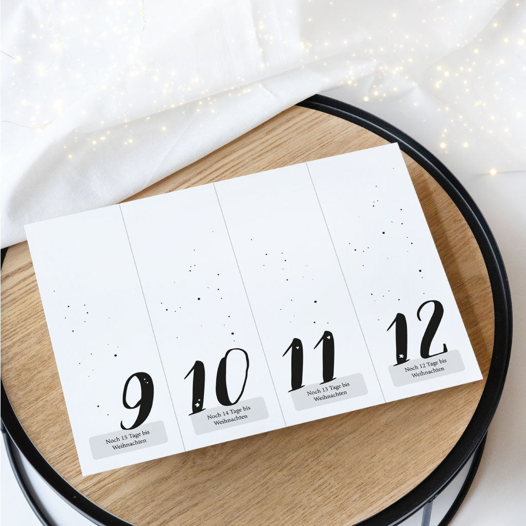 Eine der Seiten liegt ausgedruckt auf Deko, Zahlen 9-12 mit Countdown bis Weihnachten für Adventskalender