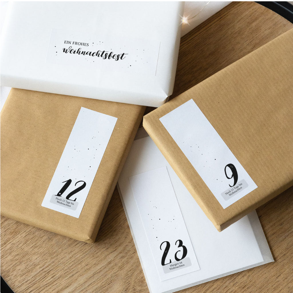 24 Adventskalender Zahlen Sticker auf kleinen Geschenken und Tüten