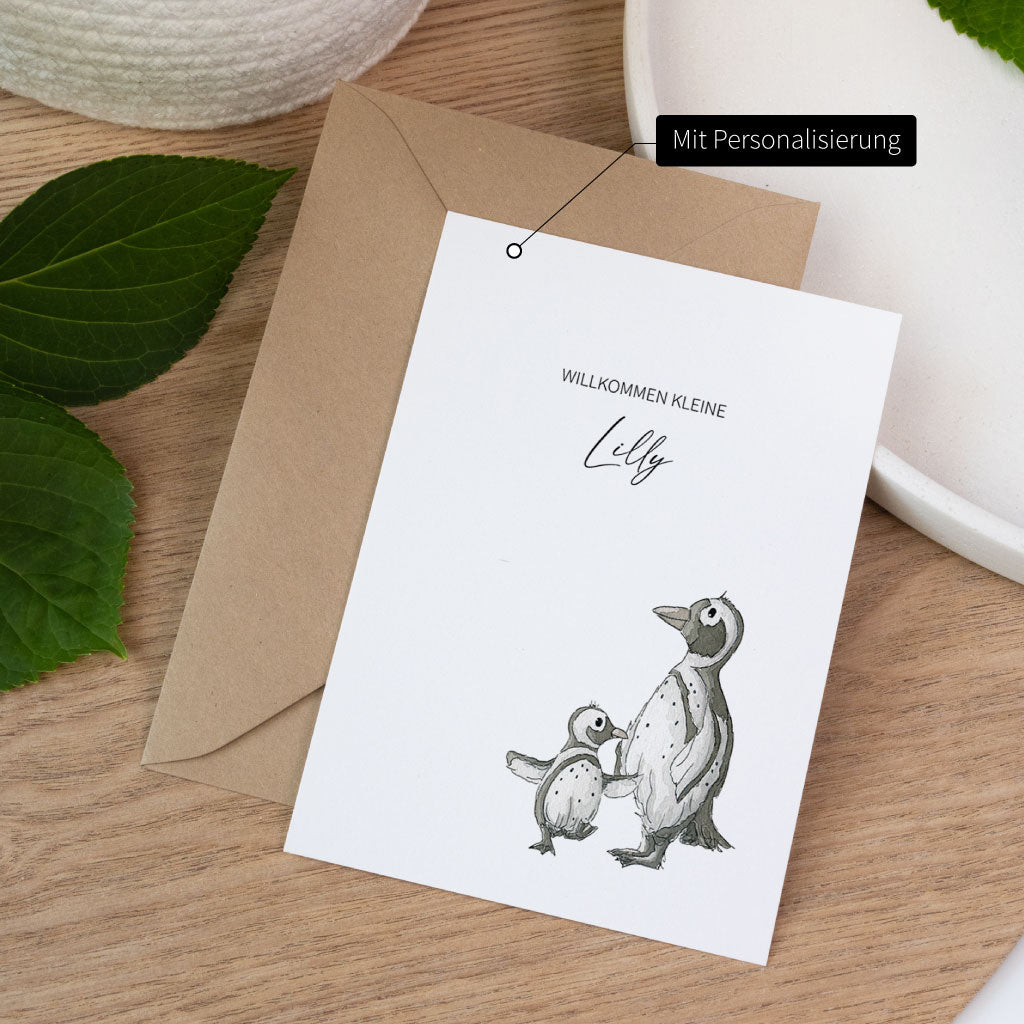 Geburtskarte mit Aquarell-Pinguinen und individueller Namenspersonalisierung, liebevoll gestaltet und hochwertig gedruckt.