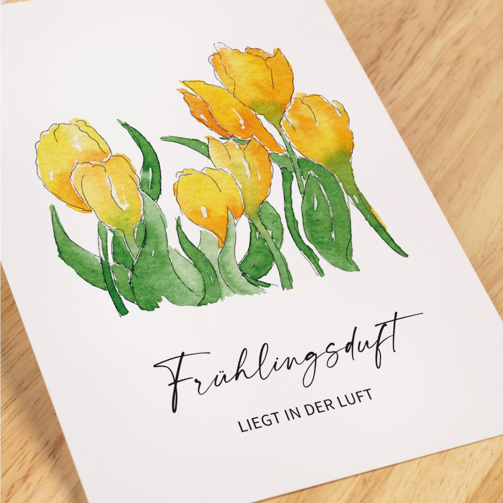 Unter den handgemalten Blumen Spruch "Frühlingsduft liegt in der Luft"