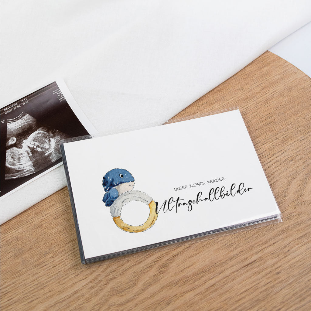 Schwarzes Einsteckalbum zur Ultraschallbilder Aufbewahrung mit Wal-Motiv – Ultraschallfoto daneben, Schutz für Bilder, Album personalisierbar und mit Aquarell-Illustration gestaltet