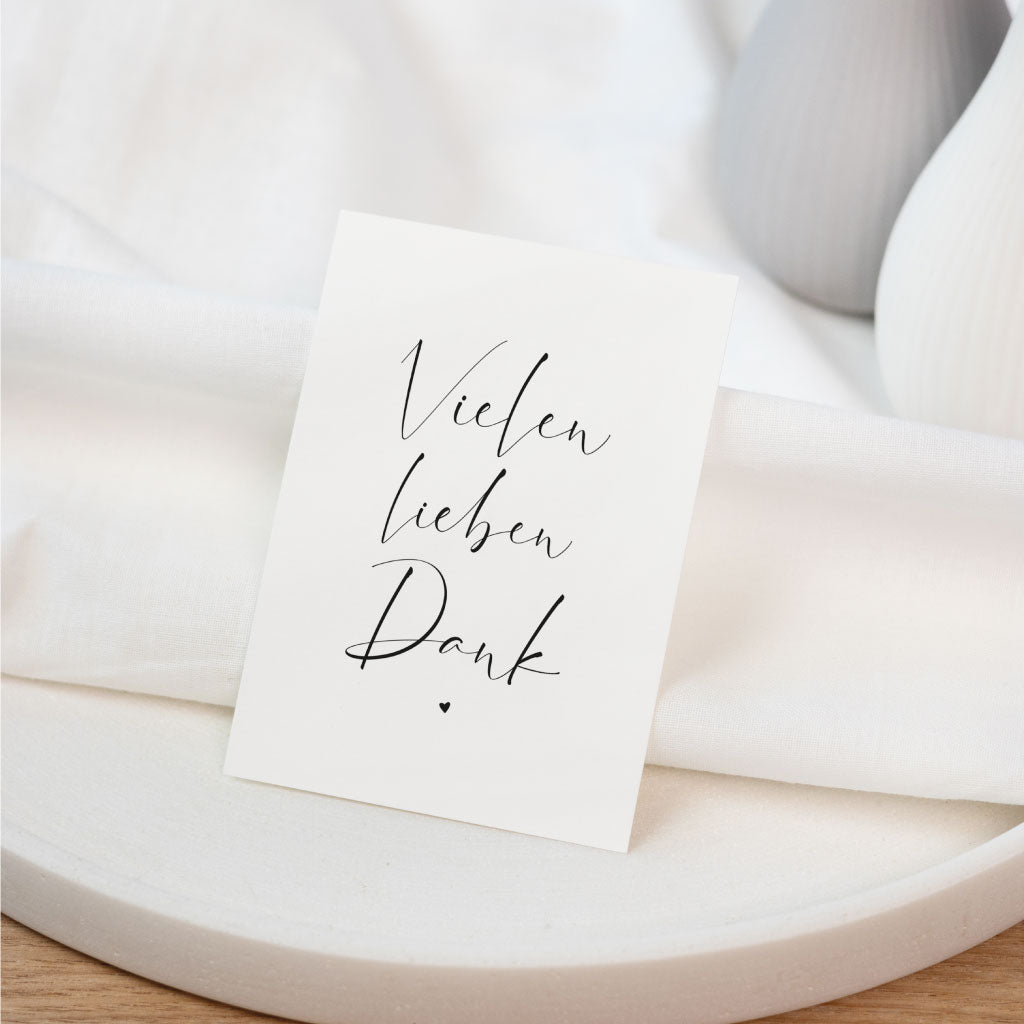 Geschwungener Schreibschrift Schriftzug Vielen lieben Dank mit Herz