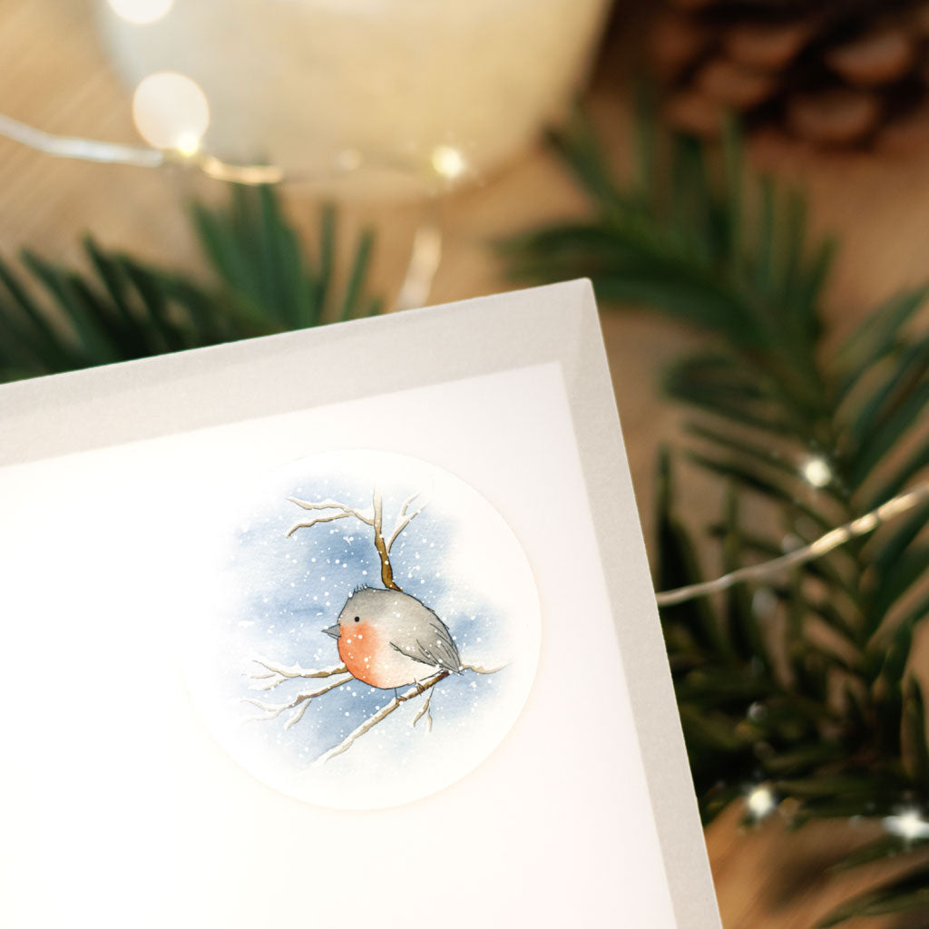 Rotkehlchen im Schnee auf Weihnachtsaufkleber