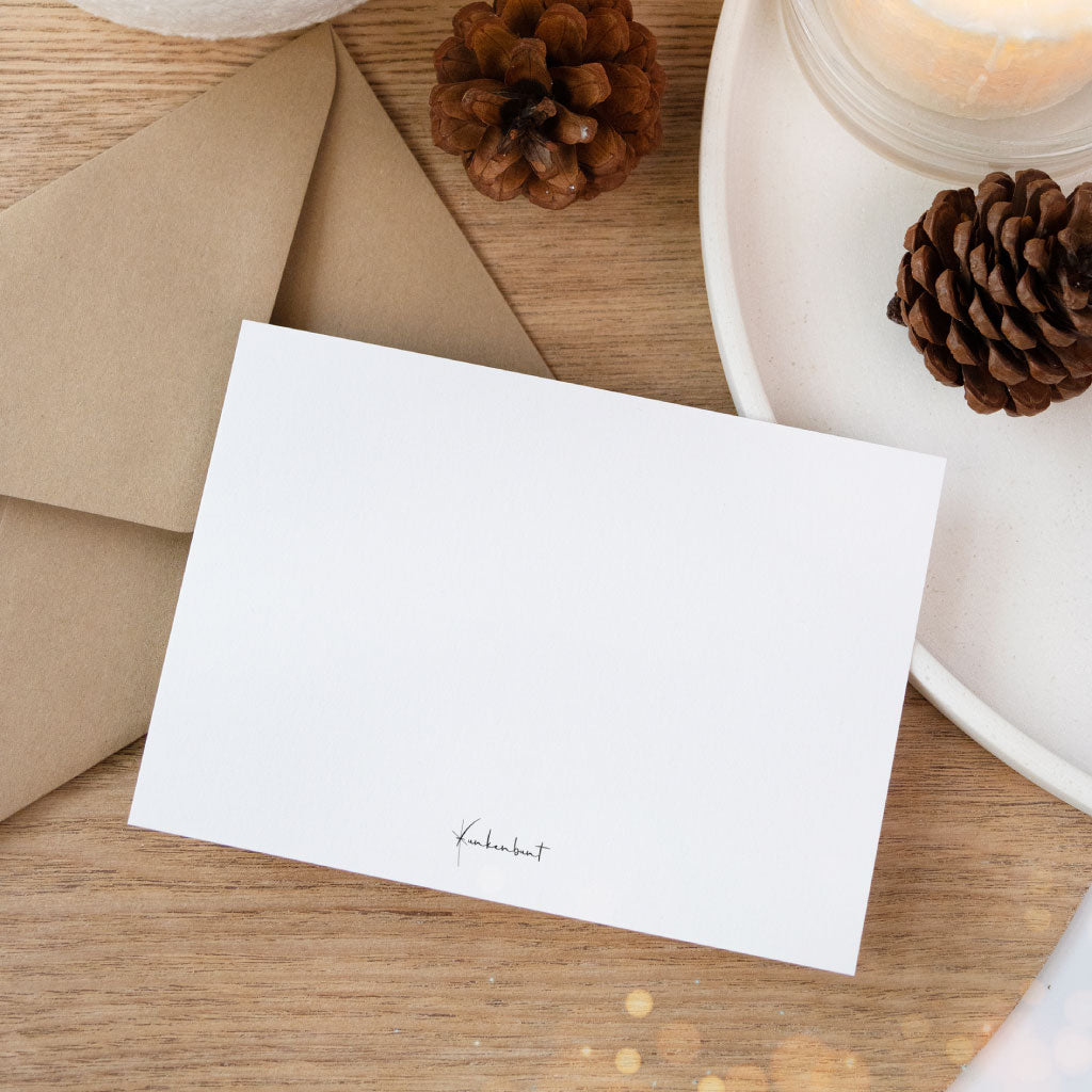 Rückseite der Weihnachtskarte mit feiner Struktur und dezentem Funkenbunt-Schriftzug – ideal zum handschriftlichen Verfassen von Neujahrs- und Weihnachtsgrüßen.