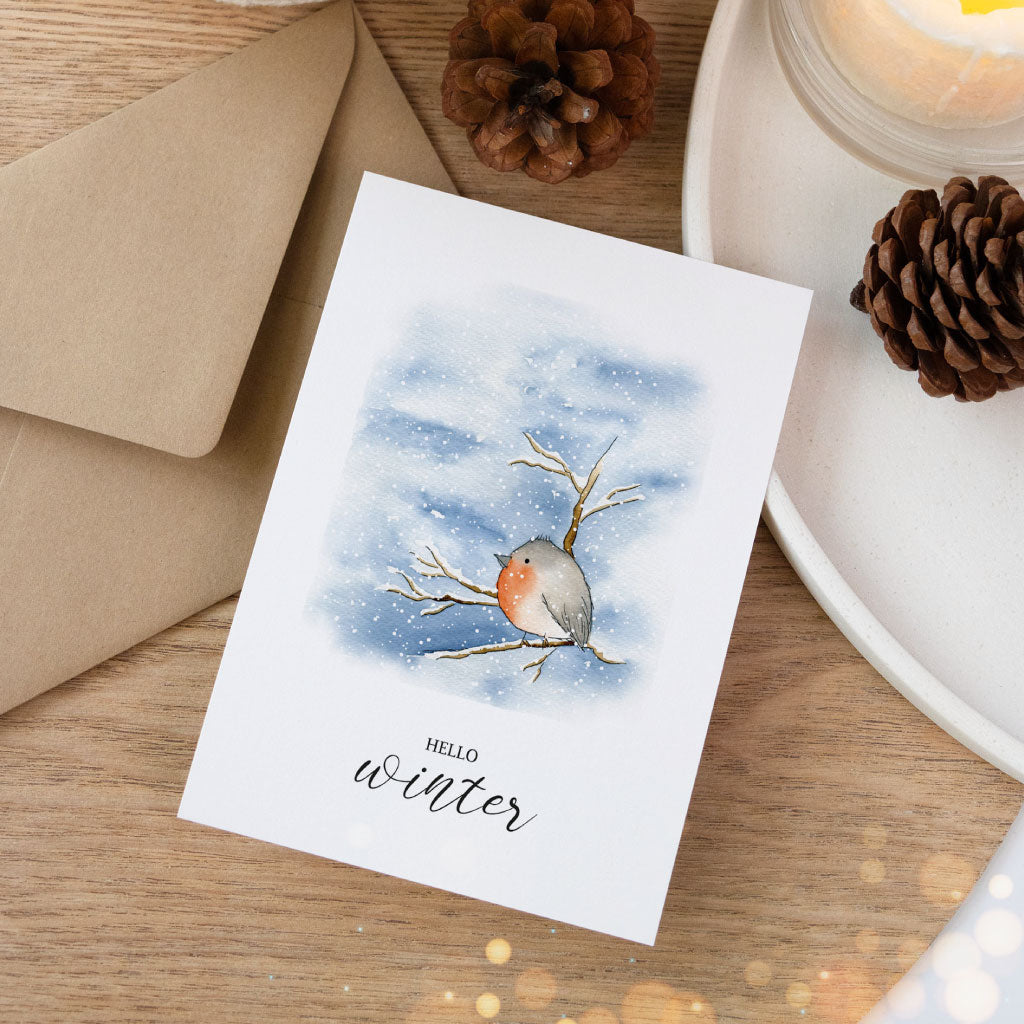 Winterliche Grußkarte mit Aquarell Rotkehlchen, hochwertige Klappkarte Weihnachten mit naturbraunem Umschlag