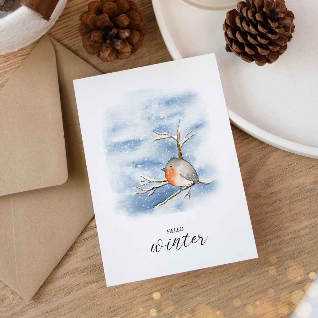 Handgemalte Künstlerkarte Weihnachten, Aquarell Rotkehlchen im Schnee auf Klappkarte für Winter und Advent