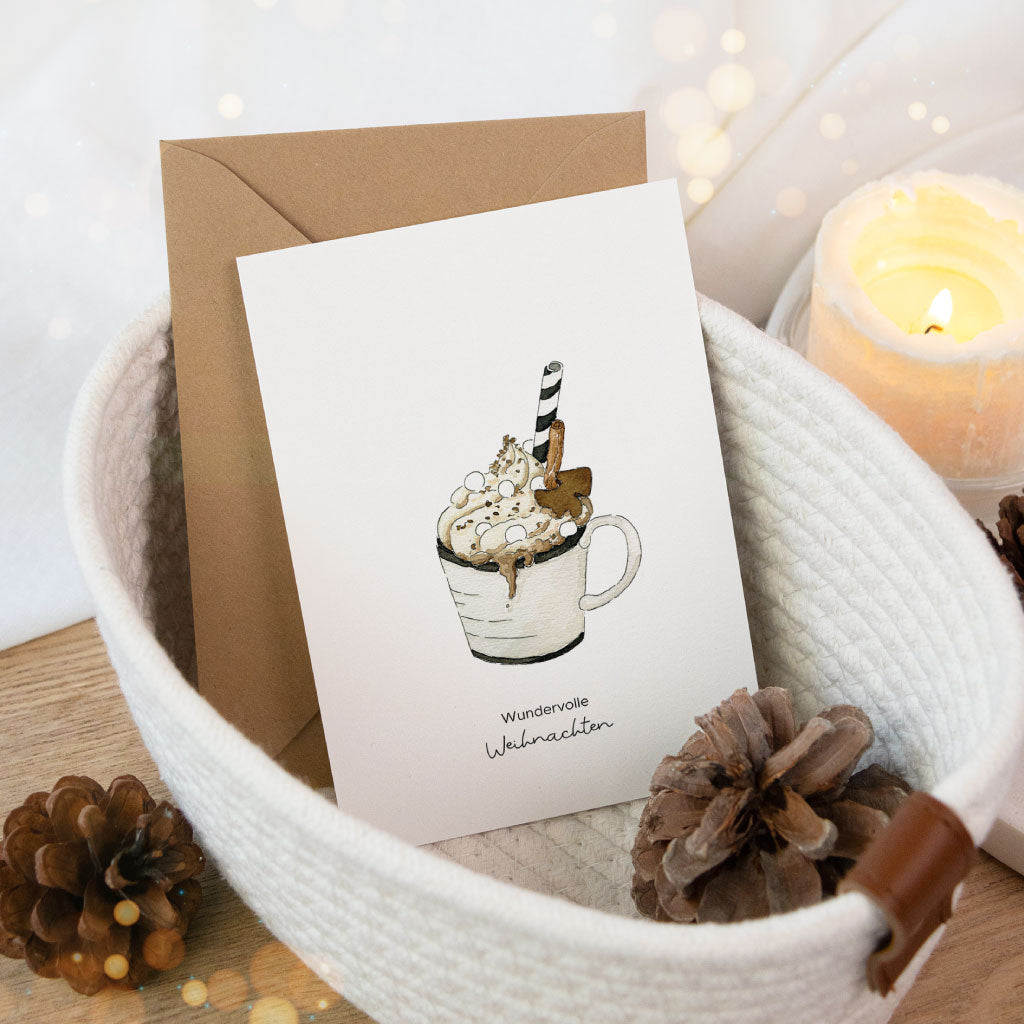 Grußkarte mit handgemaltem Aquarell einer Tasse Kakao mit Sahne und Zimt – Motiv „Wundervolle Weihnachten“, perfekt für winterliche Grüße.