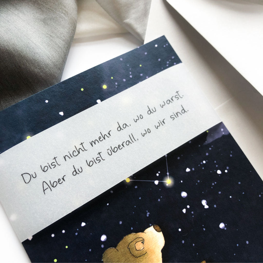 Banderole mit Spruch aus Transparentpapier über Karte