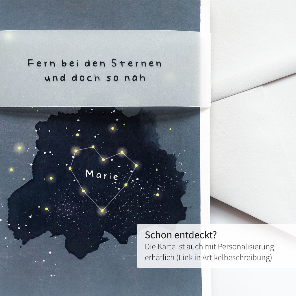 Trauerkarte mit personalisiertem Name in Herz am Sternenhimmel