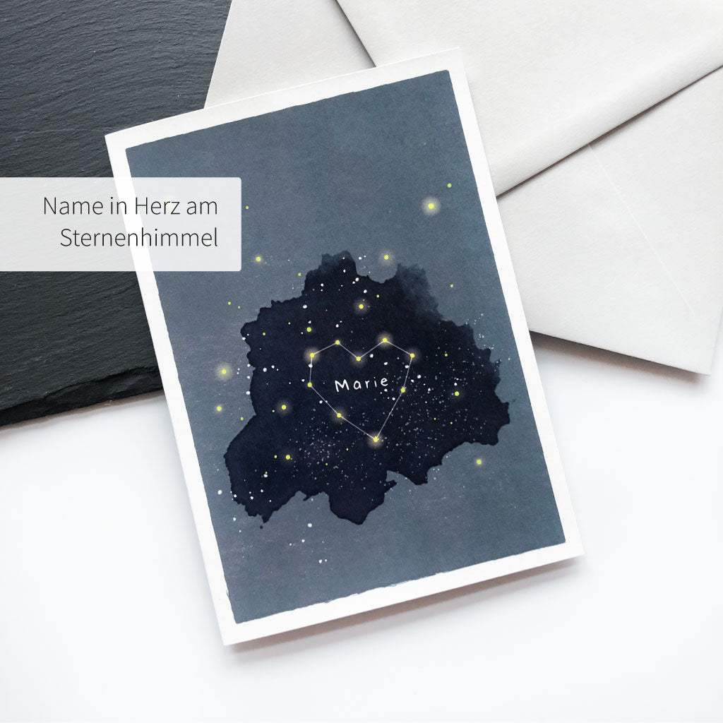 Trauerkarte mit Names des Verstorbenen in Herz am Sternenhimmel