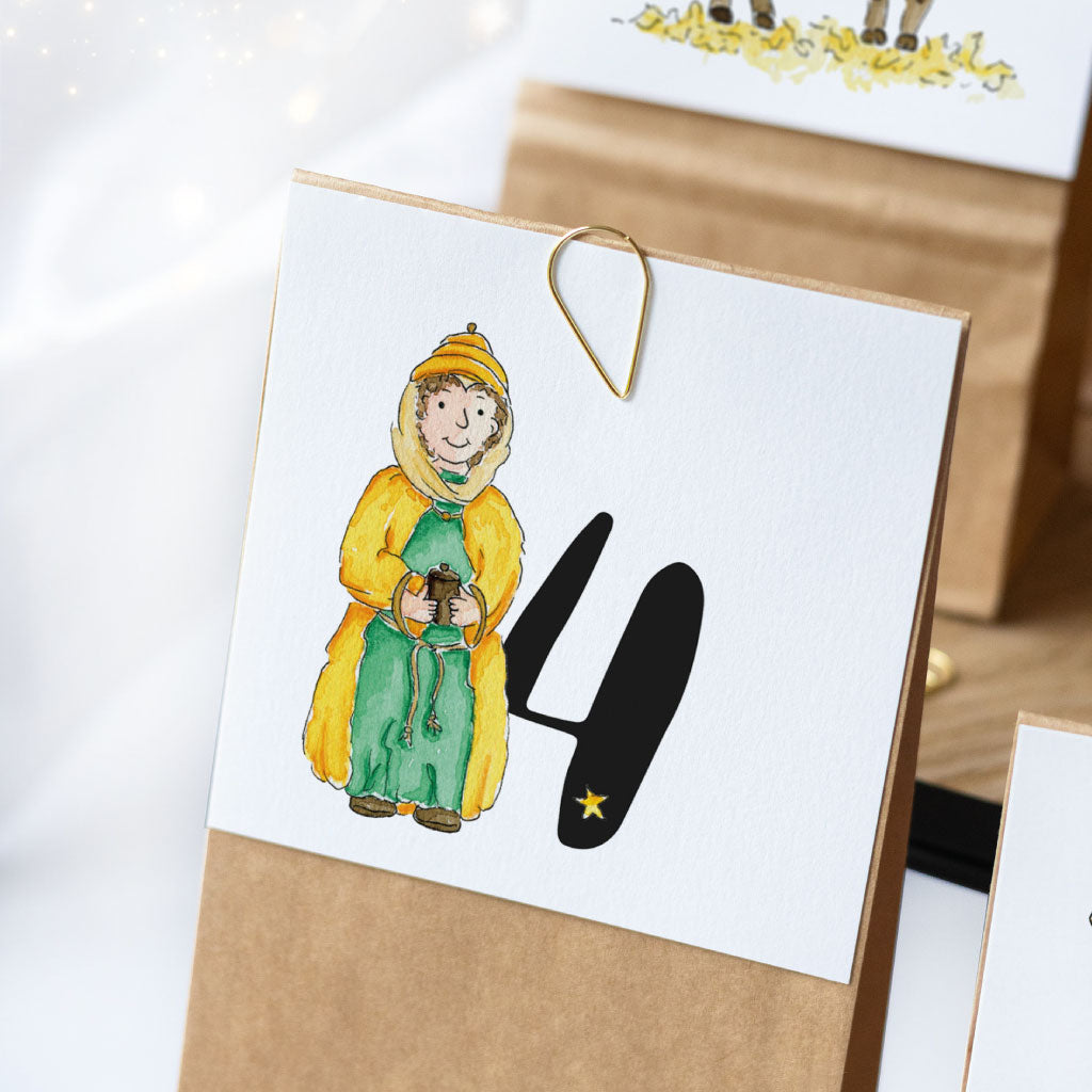 Karte mit Zahl Nummer 4 und einem der heiligen drei Könige