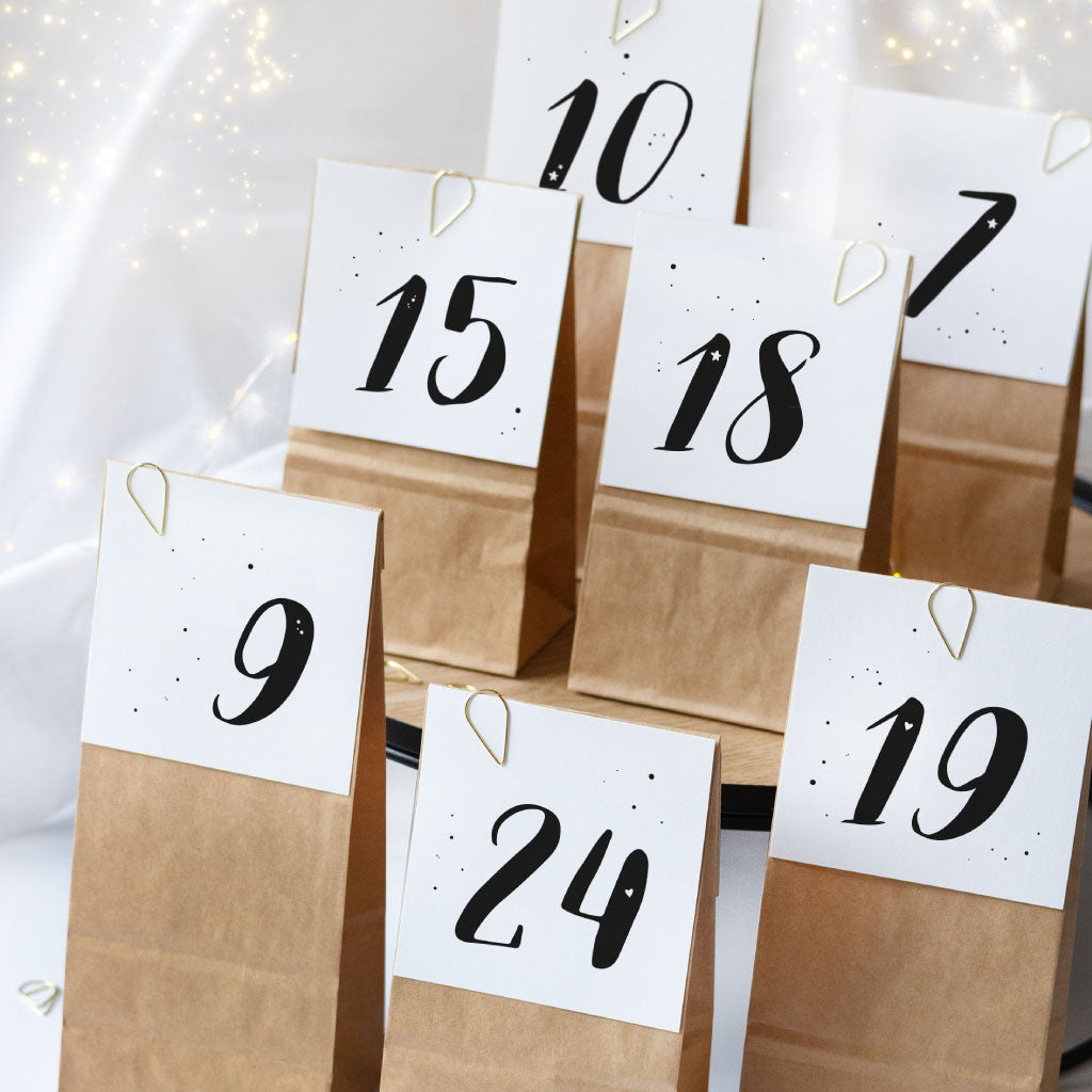 Adventskalender Karten an Kraftpapier Beuteln