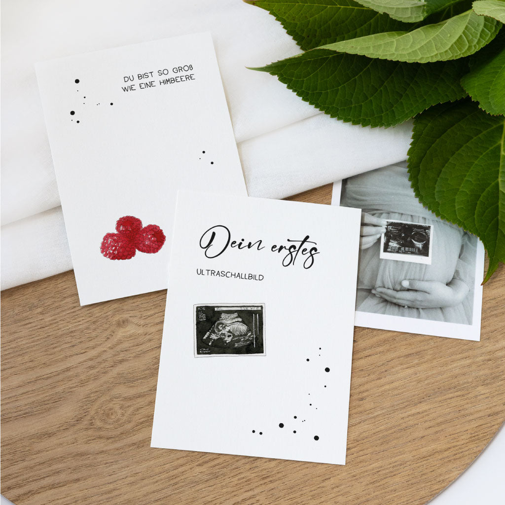 Zwei Schwangerschafts-Meilensteinkarten mit Himbeeren und Ultraschallbild – Obstgrößenvergleich und Erinnerungsmoment als digitale PDF zum Ausdrucken.