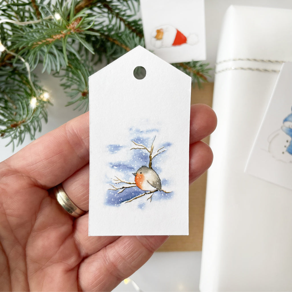 Bildmotiv Rotkehlchen im Schnee auf Geschenkanhänger, auch als physisches Produkt erhältlich