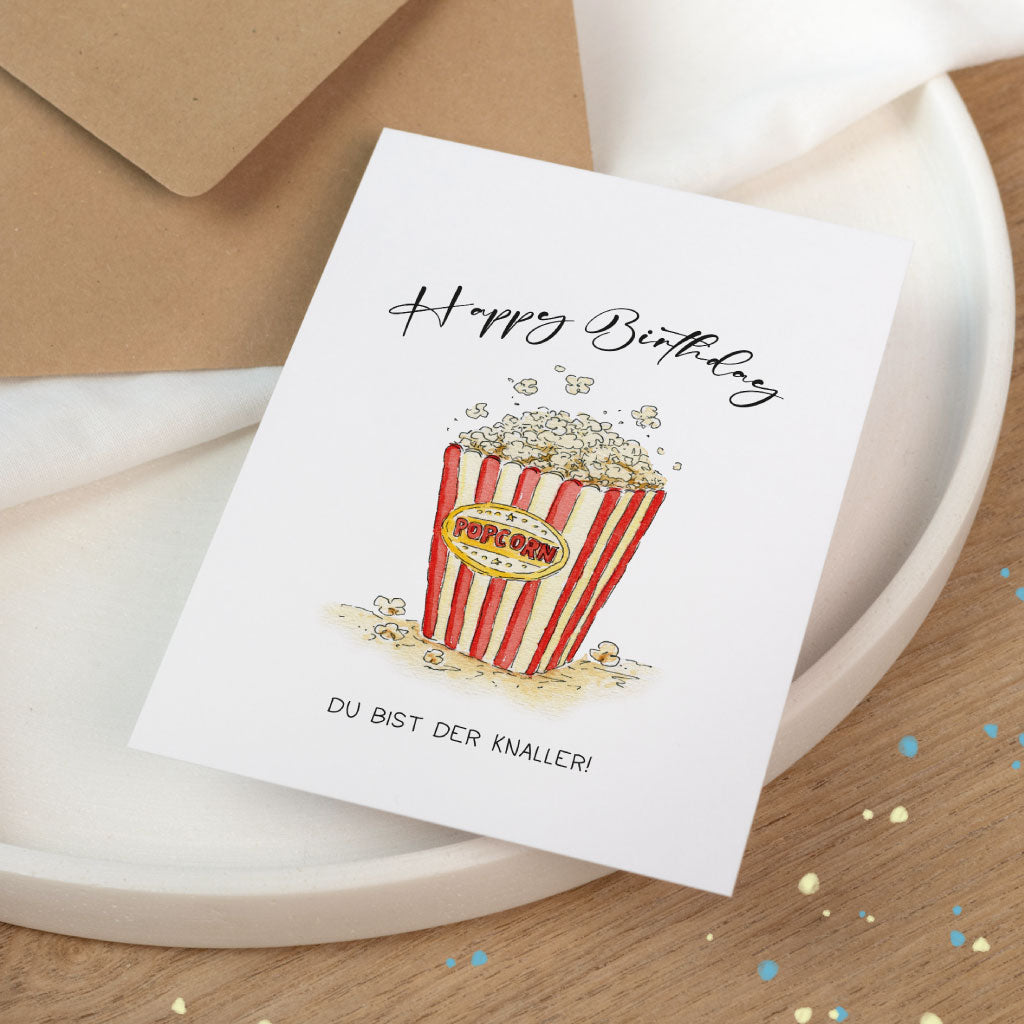 Popcornkarte im Zirkusstil mit Aquarell-Design und Konfettidetails, ohne Namenspersonalisierung – modern und verspielt.