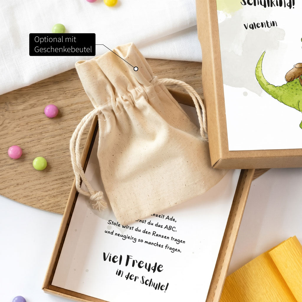Beige Baumwolltasche in der Geschenkschachtel als optionale Verpackung für Münzen oder kleine Überraschungen.