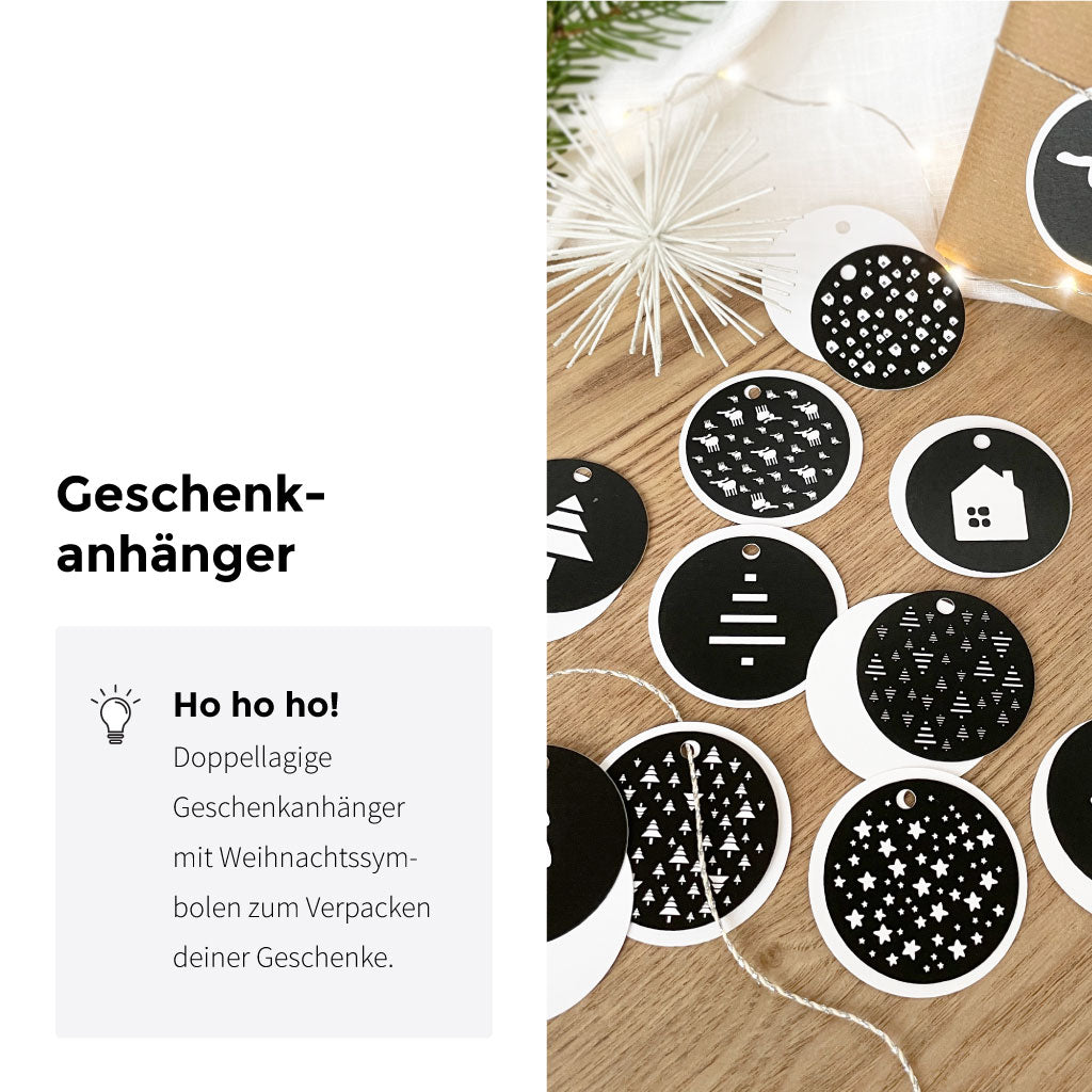 Doppellagige Anhänger zum Weihnachtsgeschenke verpacken in schlichter schwarz weißer Optik mit Weihnachtssymbolen