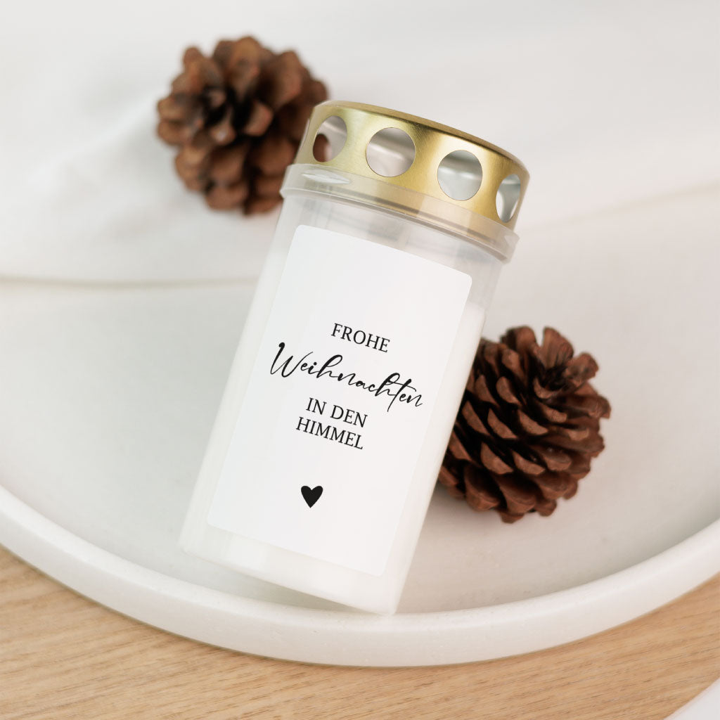 Einzelne Grabkerze mit der Aufschrift „Frohe Weihnachten in den Himmel“ – stimmungsvolle Trauerkerze als liebevolles Andenken zur Weihnachtszeit.