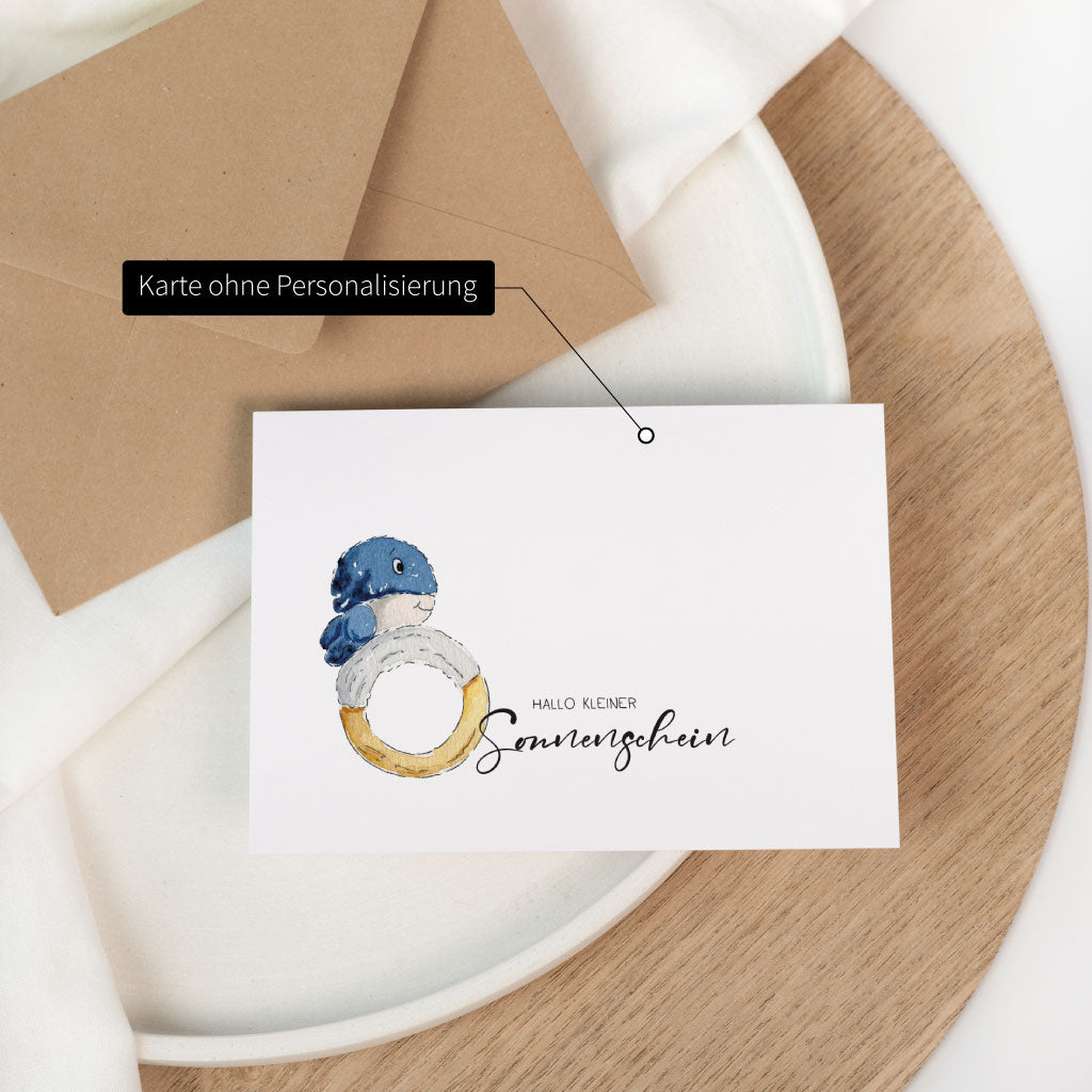 Glückwunschkarte zur Geburt ohne Personalisierung: Wal-Baby Motiv und Text „Hallo kleiner Sonnenschein“ auf der Vorderseite, Hinweis „Karte ohne Personalisierung“.