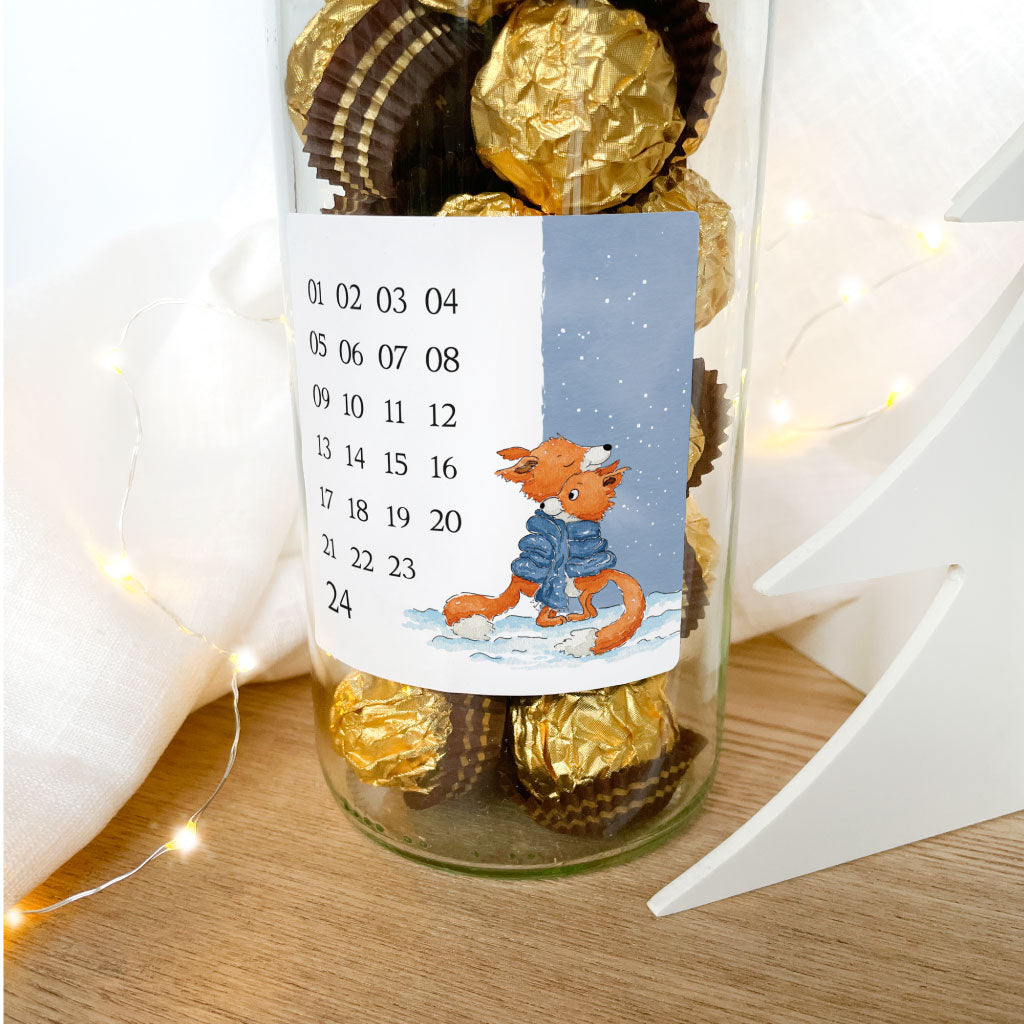 Sticker klebt auf Glas mit Schokoladen Pralinen