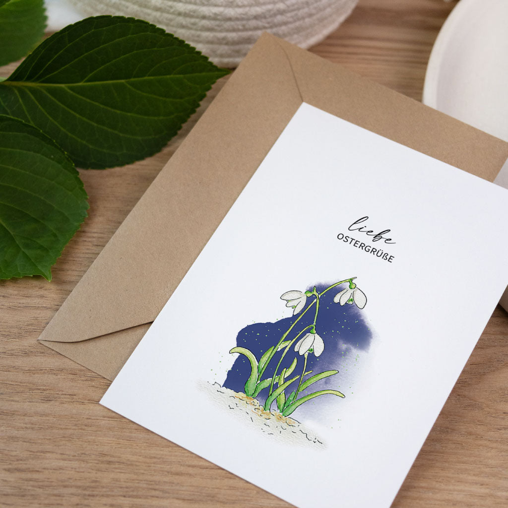 Osterkarte im Aquarell Stil mit Schneeglöckchen Illustration und Text liebe Ostergrüße, natürliche Klappkarte für Ostern.