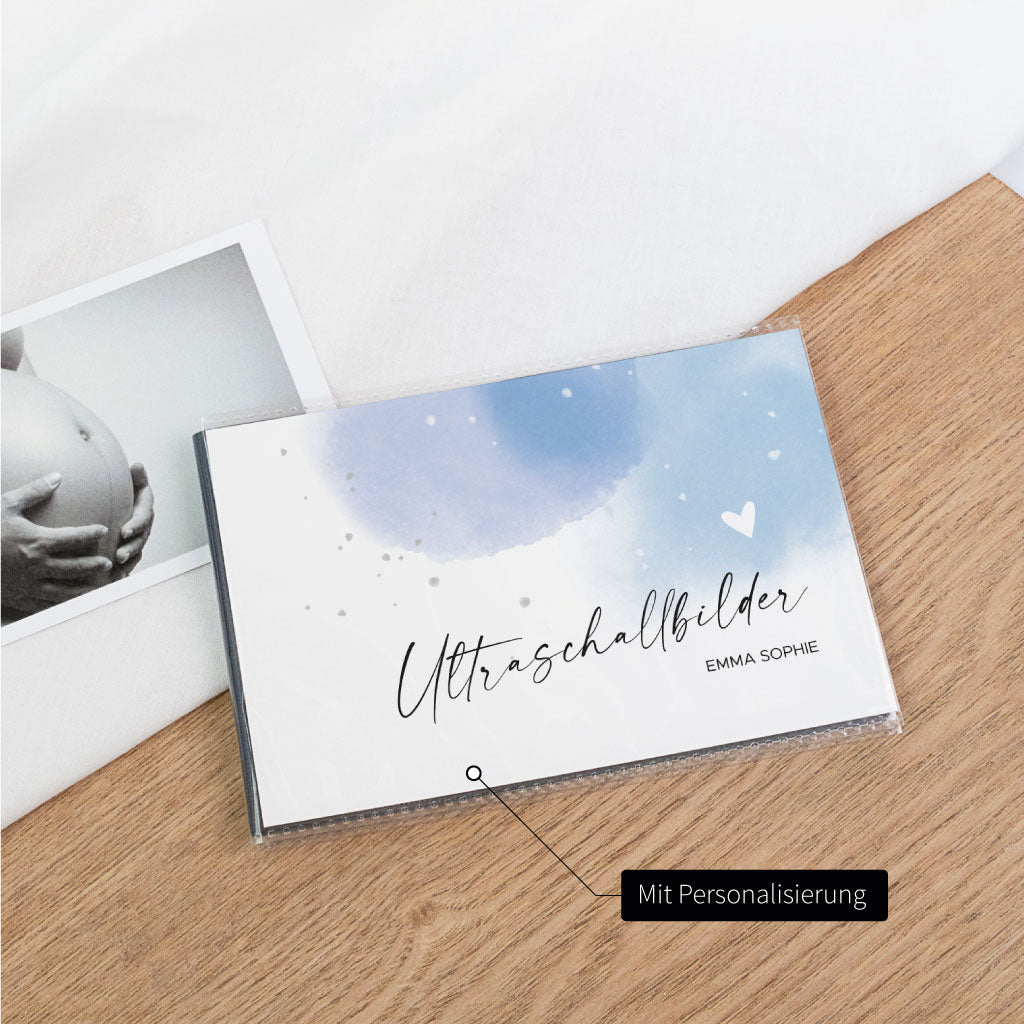 Schwarzes Ultraschallbilder Album mit Hinweis „Mit Personalisierung“ – Einsteckalbum zum Schutz für Ultraschall Fotos, blaues Cover und Namensfeld