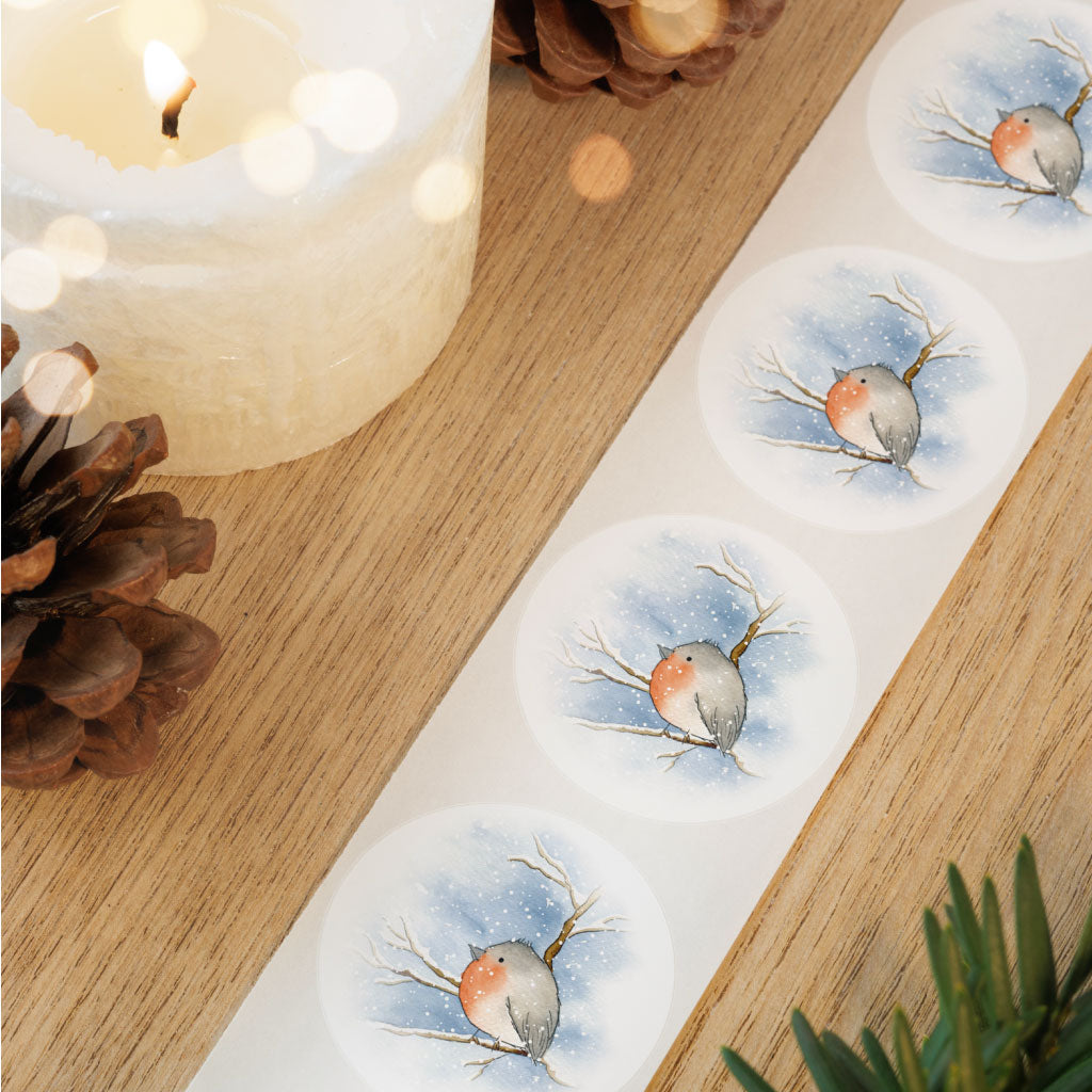 Aufkleber mit Vogel im Schnee zum Weihnachtsgeschenke verpacken