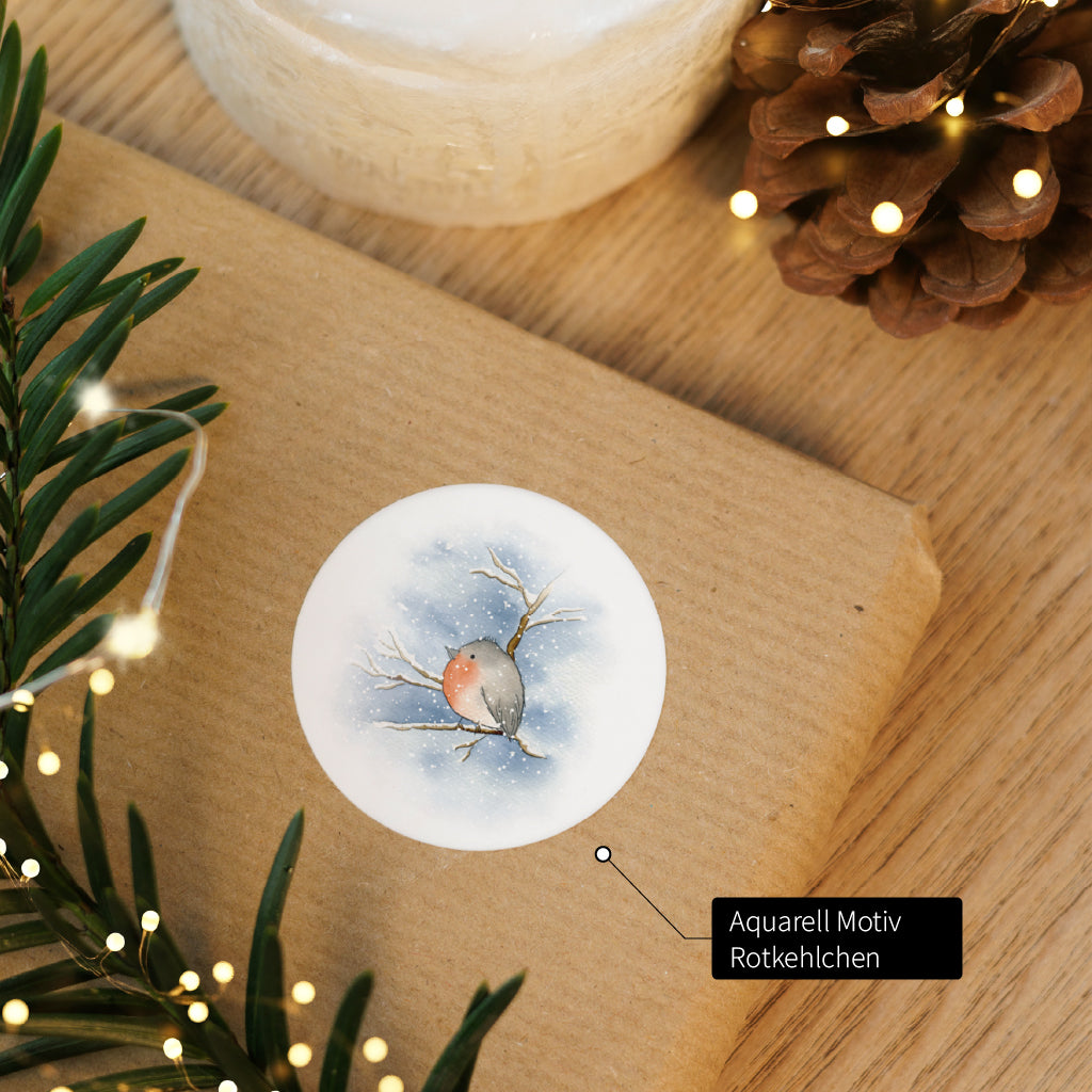 Runder Weihnachtsaufkleber mit Rotkehlchen Aquarell Motiv perfekt zum Verschönern von Weihnachtspost.