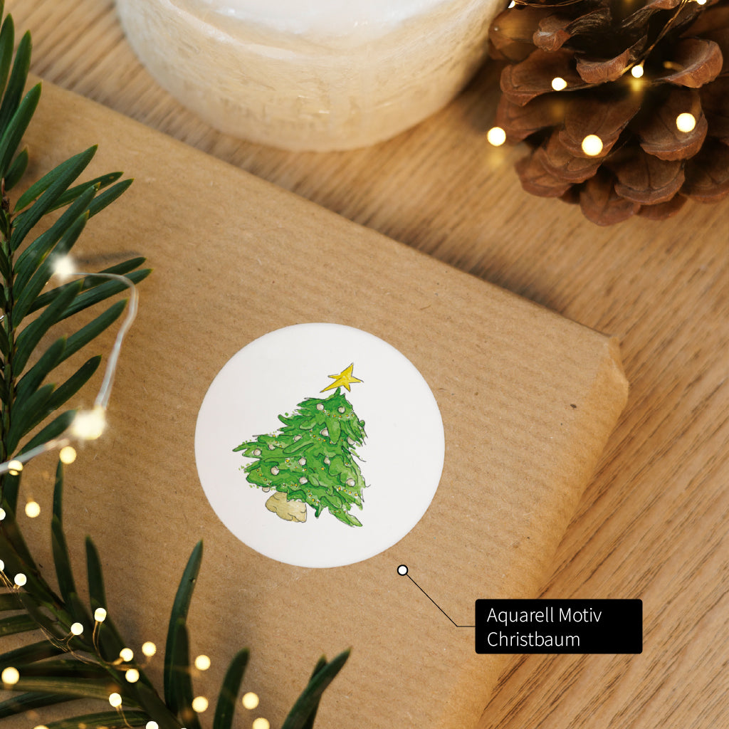 Weihnachtsaufkleber mit grünem Christbaum Aquarell Motiv bringt Vorfreude beim Geschenke verpacken.