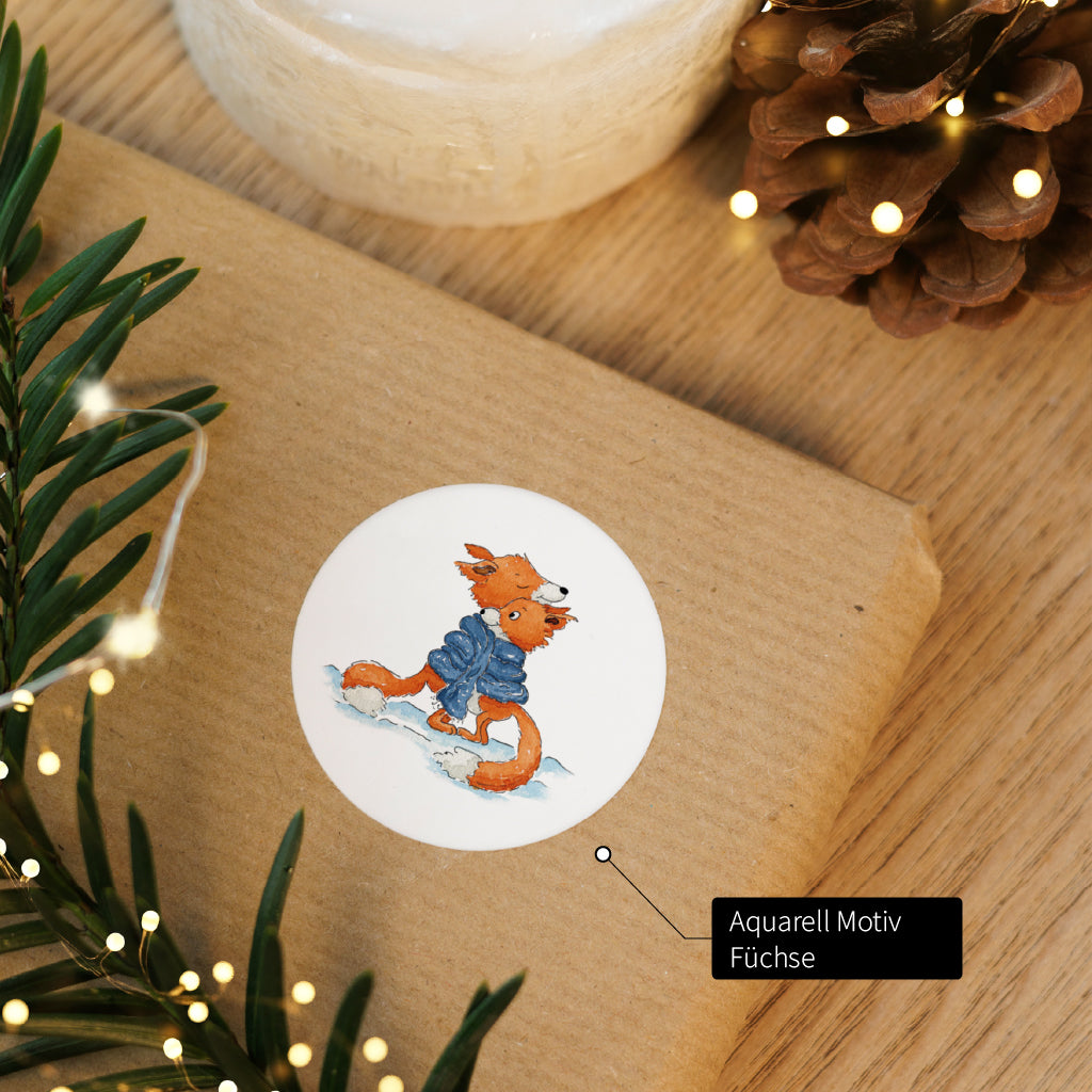 Weihnachtsaufkleber mit niedlichem Füchse Aquarell Motiv zum Geschenke verpacken in der Adventszeit.