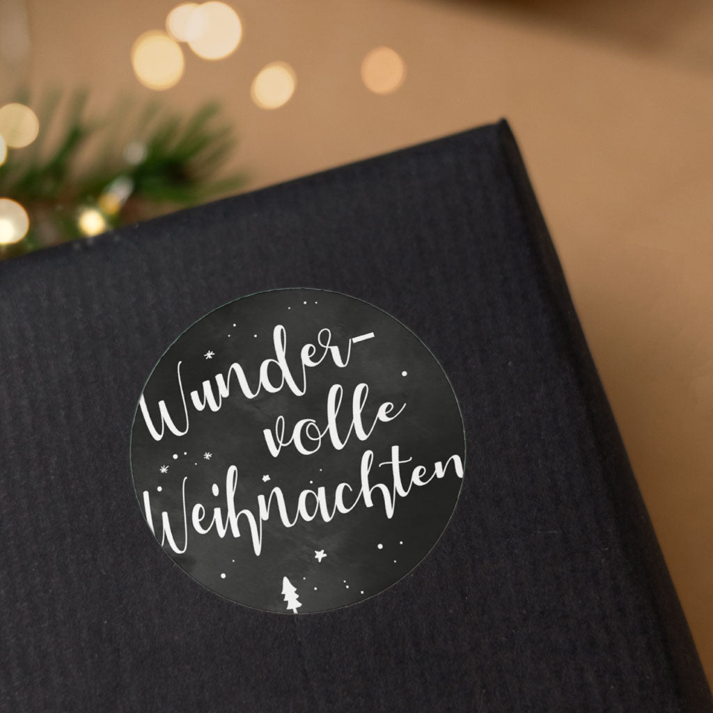 Schwarzer Weihnachtsaufkleber mit weißem Text "Wundervolle Weihnachten"