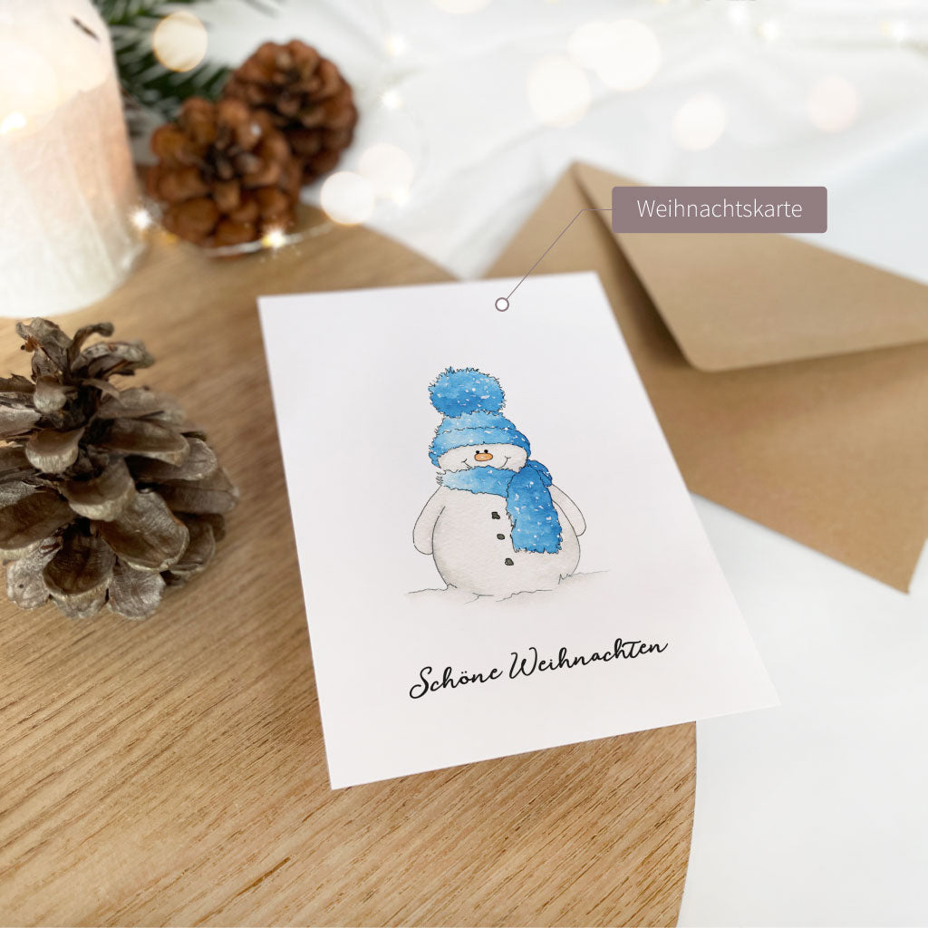 Das Motiv mit dem Schneemann gibt es auch als Weihnachtskarte