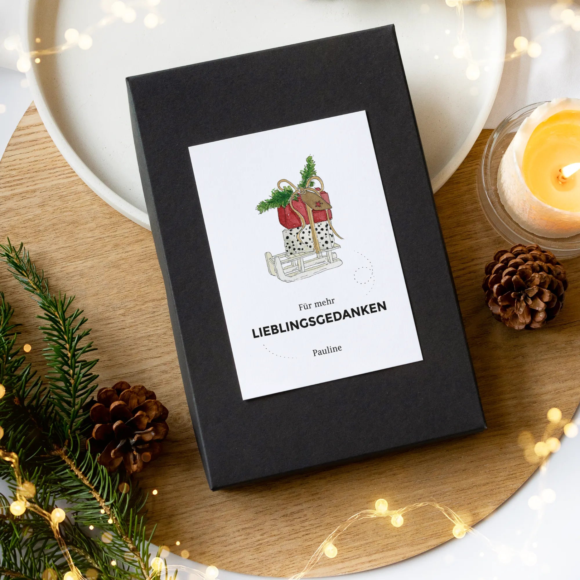 Schwarze Weihnachts-Geschenkbox mit Aquarell Motiv Schlitten und Spruch Lieblingsgedanken, fertig zum Verschenken, weihnachtliche Dekoration