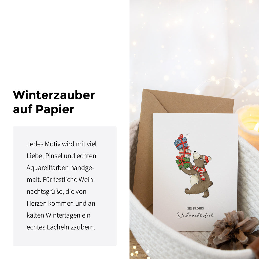 Weihnachtspostkarte mit Bär Motiv in einem Korb drapiert neben dem Text Winterzauber auf Papier.