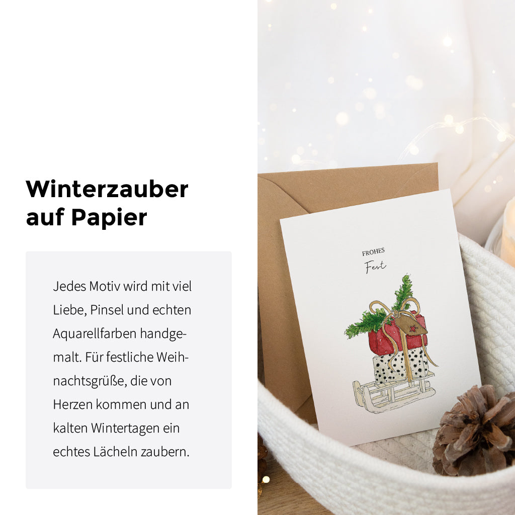 Festliche Weihnachtskarte mit Schlitten Aquarell Motiv neben Text über Wintermagie und echte Aquarellfarben.