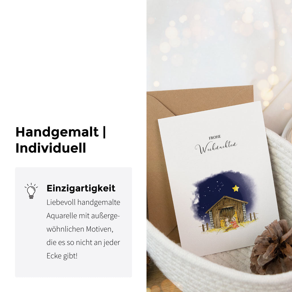 Detailaufnahme der Klappkarte mit Aquarell-Krippenszene, präsentiert in gemütlichem Setting – perfekte Künstlerkarte für Weihnachten.