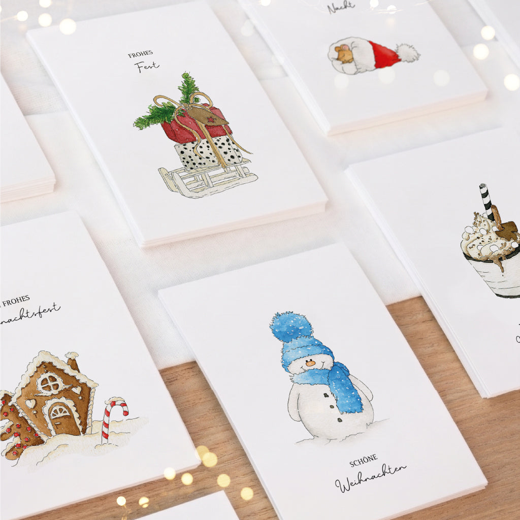 Übersicht vom Weihnachtskarten Set mit sechs handgemalten Aquarellen für festliche Weihnachtsgrüße.